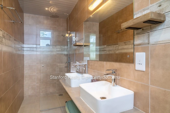 Beachfront Apartment for Sale – 2 En-Suite Bedrooms, Trou d’Eau Douce, East